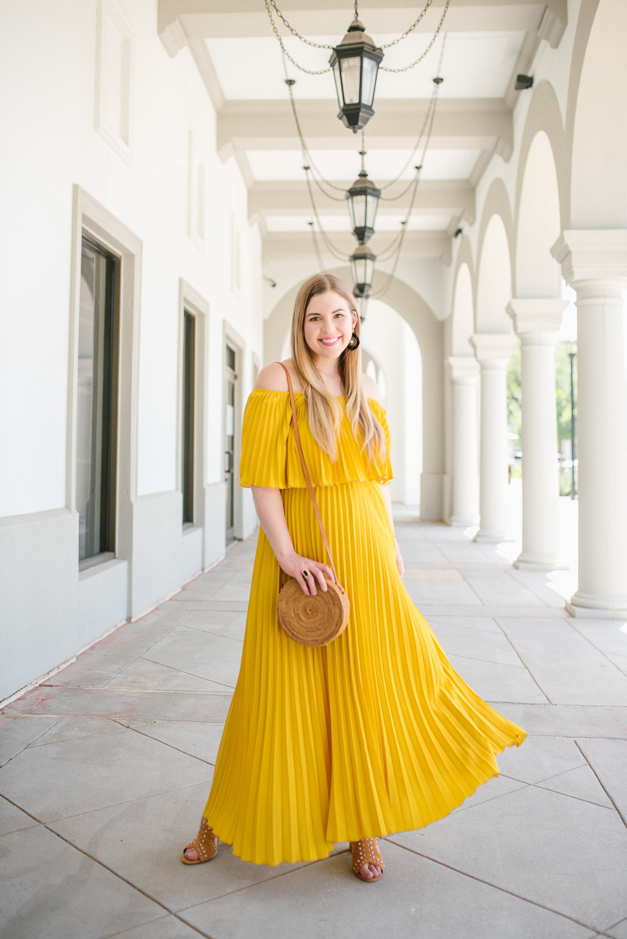 8 Amazing Dresses for Summer Travel - Yellow Pleated Maxi Dress worn by Cup of Charisma Jillian Goltzman Houston Fashion Blogger 1