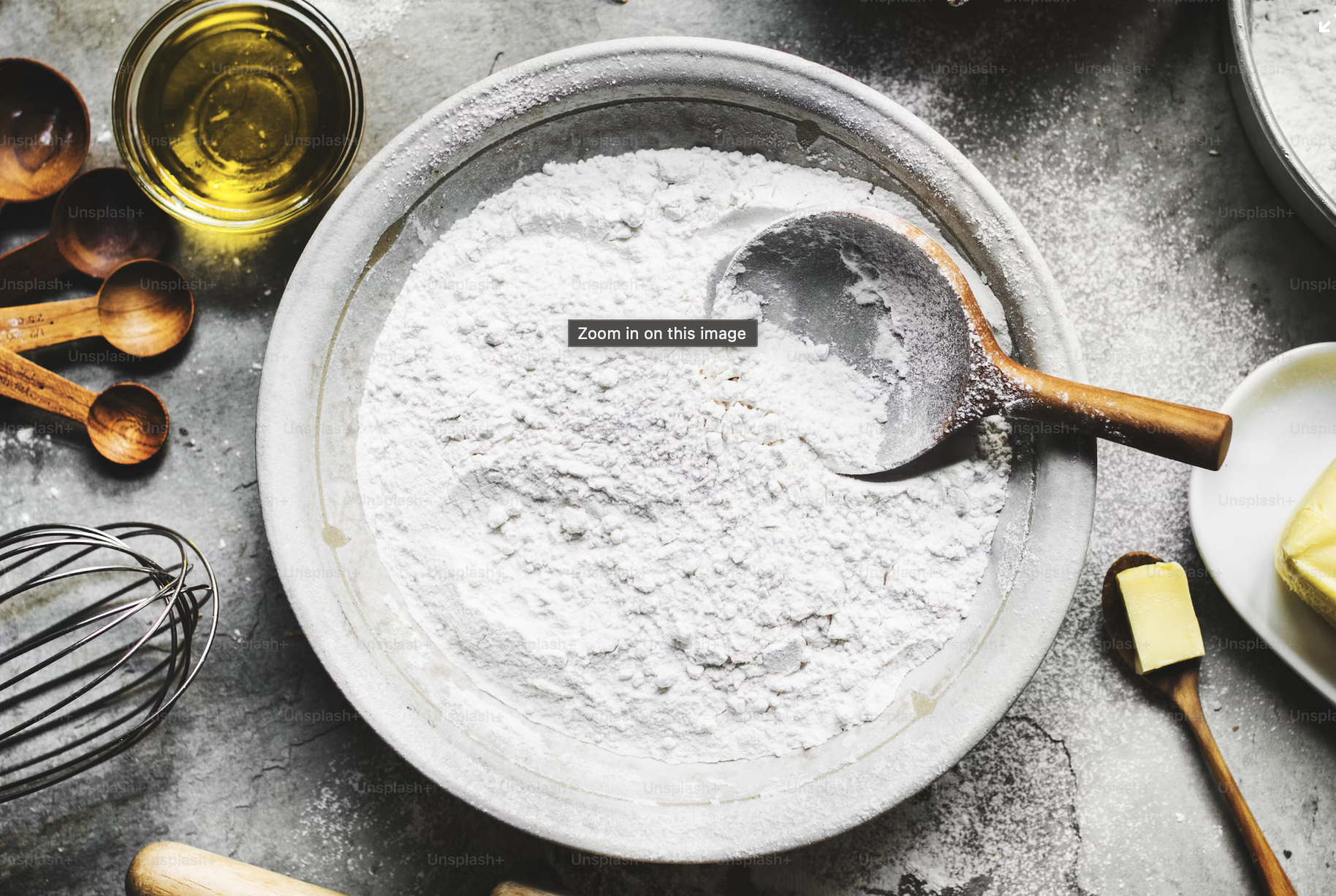 A mixing bowl filled with cake batter, ready for baking